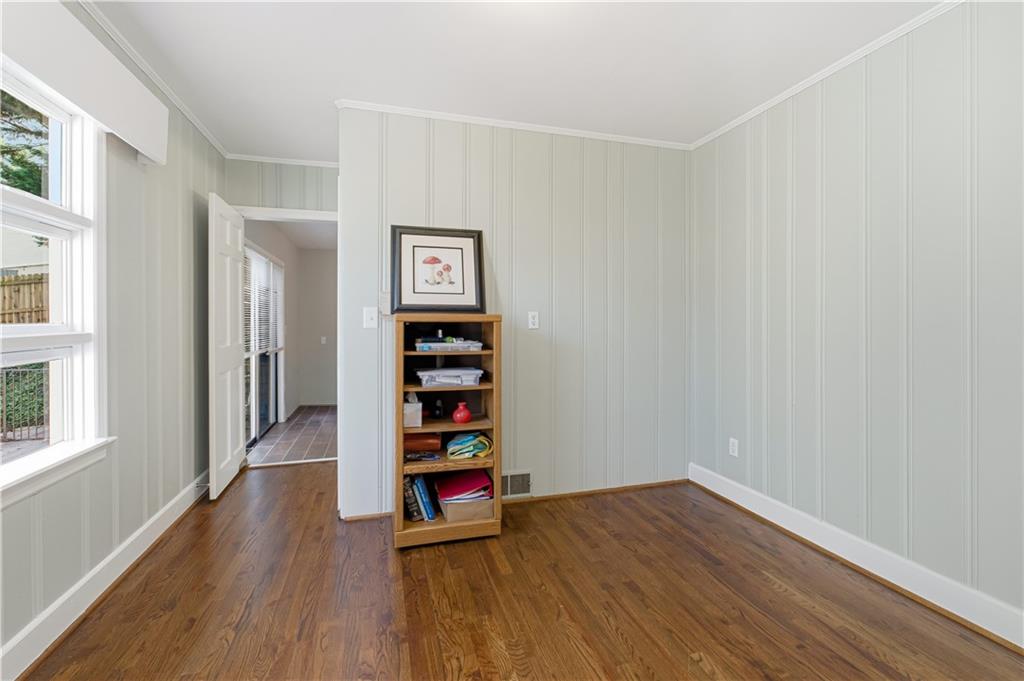 531 Crestview Terrace Gainesville, GA 30501 - Photo 14 of 54 wooden floor in an empty room with a window