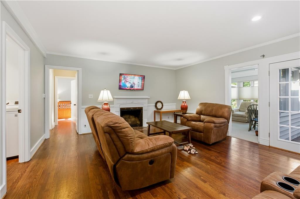 531 Crestview Terrace Gainesville, GA 30501 - Photo 15 of 54 a living room with furniture fireplace and wooden floor