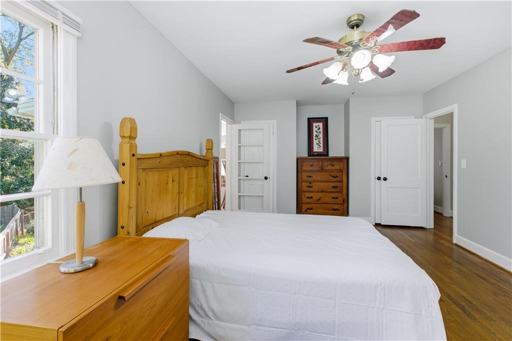 531 Crestview Terrace Gainesville, GA 30501 - Photo 20 of 54 a bedroom with a bed and wooden floor