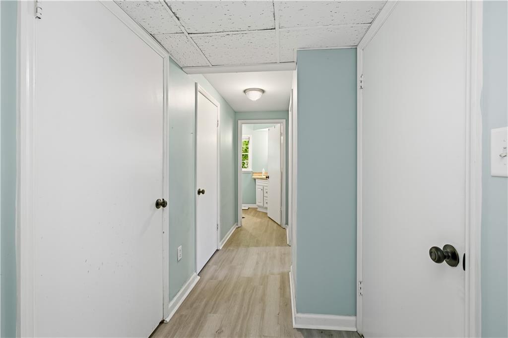 531 Crestview Terrace Gainesville, GA 30501 - Photo 37 of 54 a view of a hallway with wooden floor