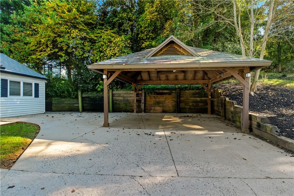 531 Crestview Terrace Gainesville, GA 30501 - Photo 6 of 54 a front view of a house with a yard and garage