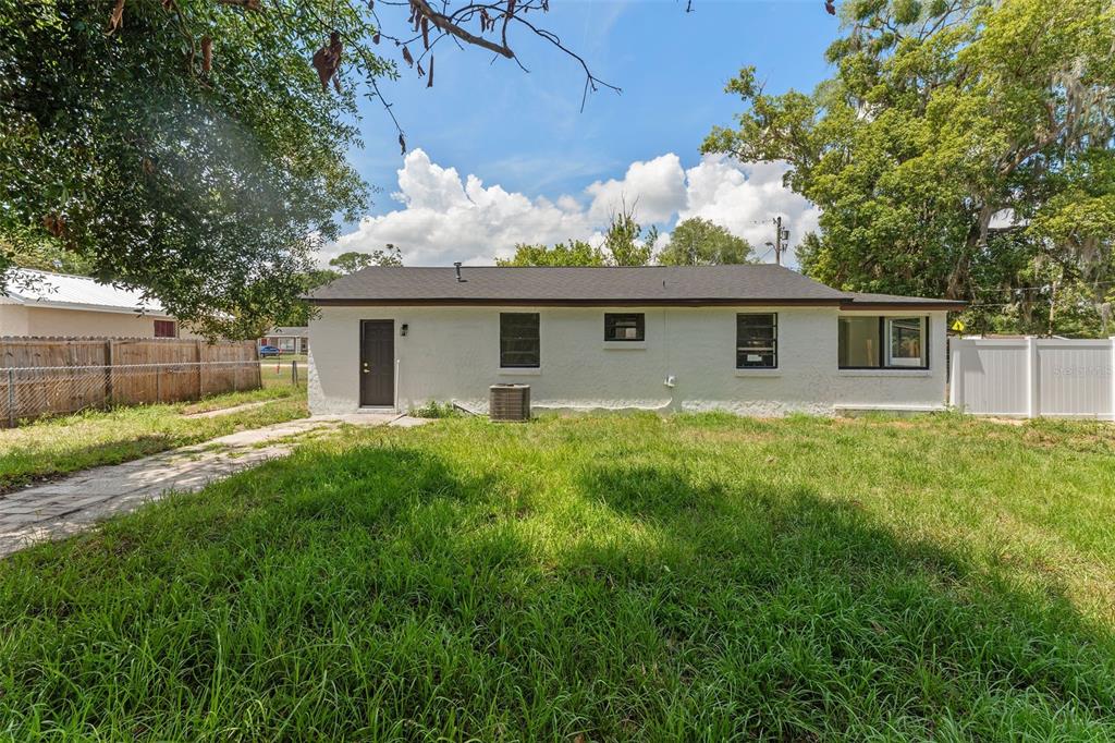 17 Palmira Road DeBary, FL 32713 - Photo 27 of 28 a front view of house with yard and green space