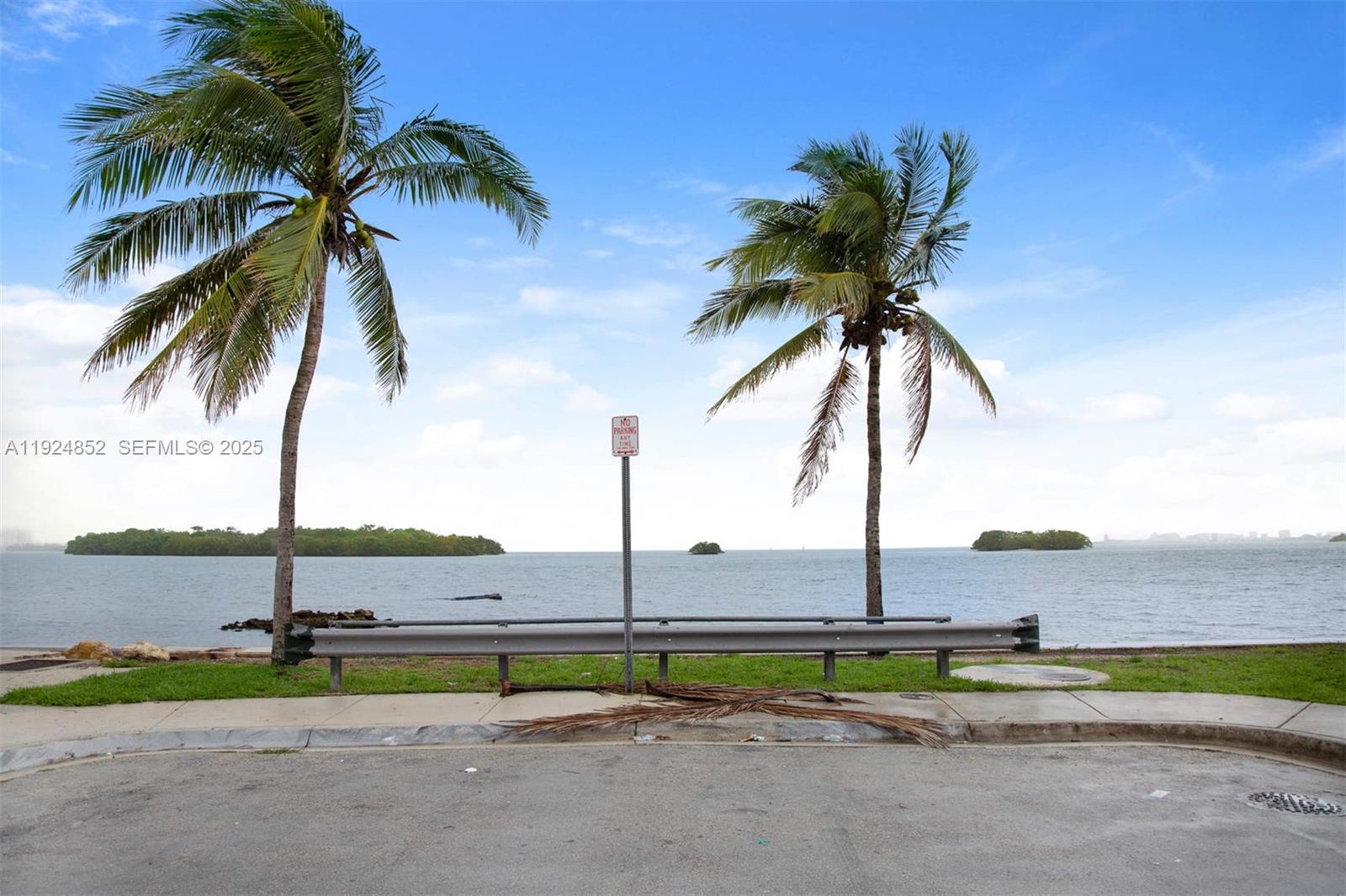 623 Northeast 61st Street, Unit 5 Miami, FL 33137 - Photo 12 of 12 a view of beach and ocean view