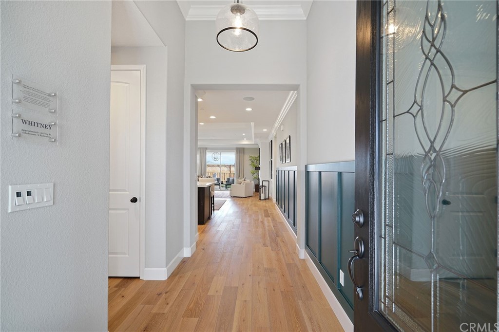 3445 Chamberlain Run Chico, CA 95973 - Photo 2 of 17 a view of a hallway with wooden floor