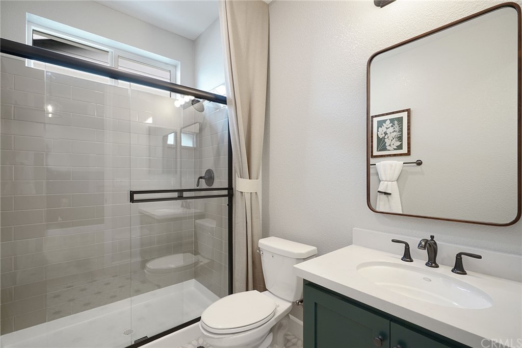 3445 Chamberlain Run Chico, CA 95973 - Photo 5 of 17 a bathroom with a sink and a mirror