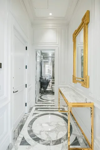 a picture of a bathroom with a sink and a mirror