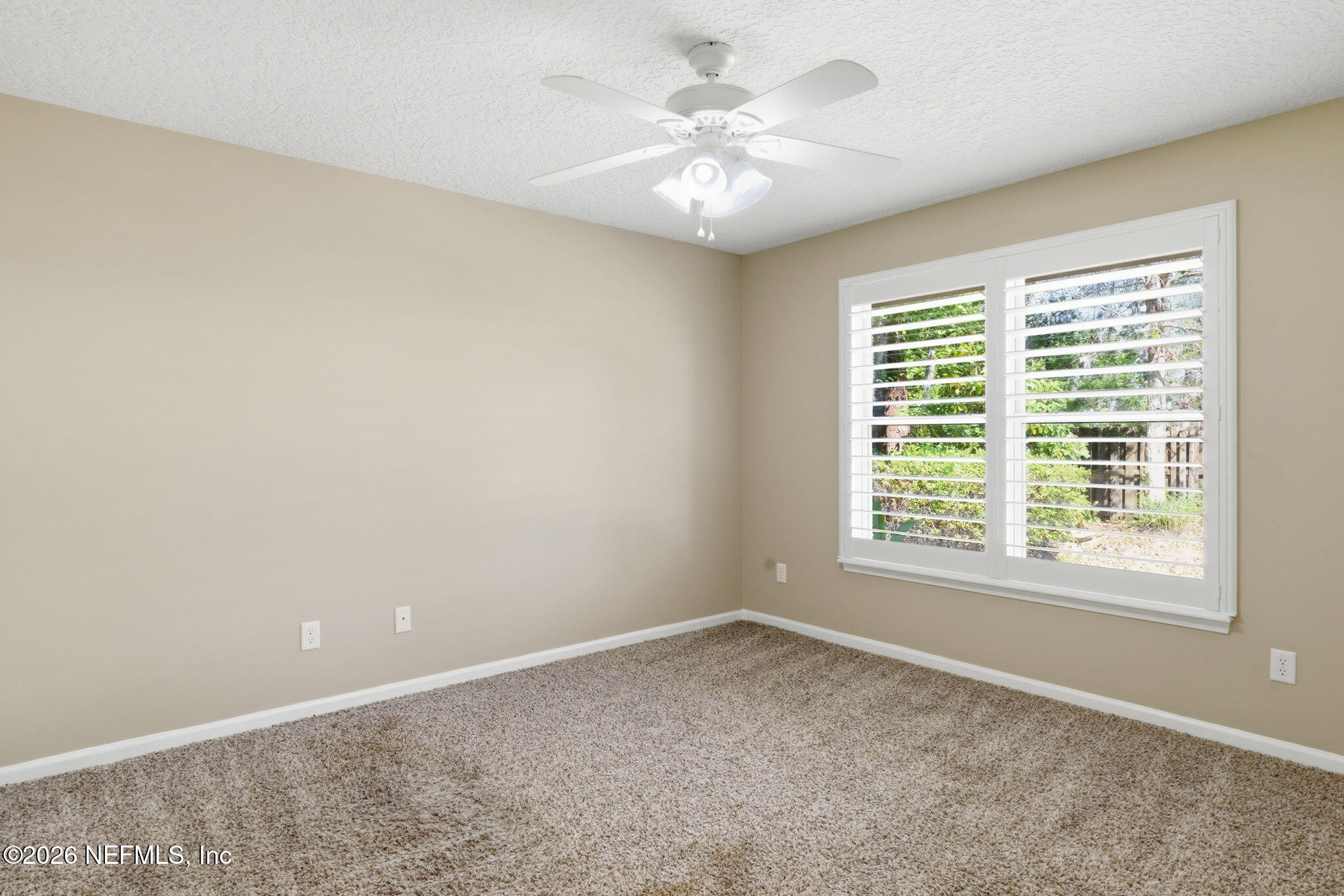1600 Spring Water Court Fleming Island, FL 32003 - Photo 39 of 85 an empty room with a window