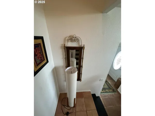 a view of entryway with kitchen