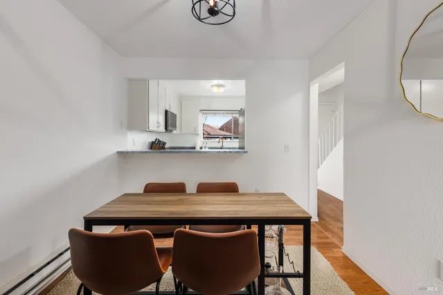 a view of kitchen island with wooden floor