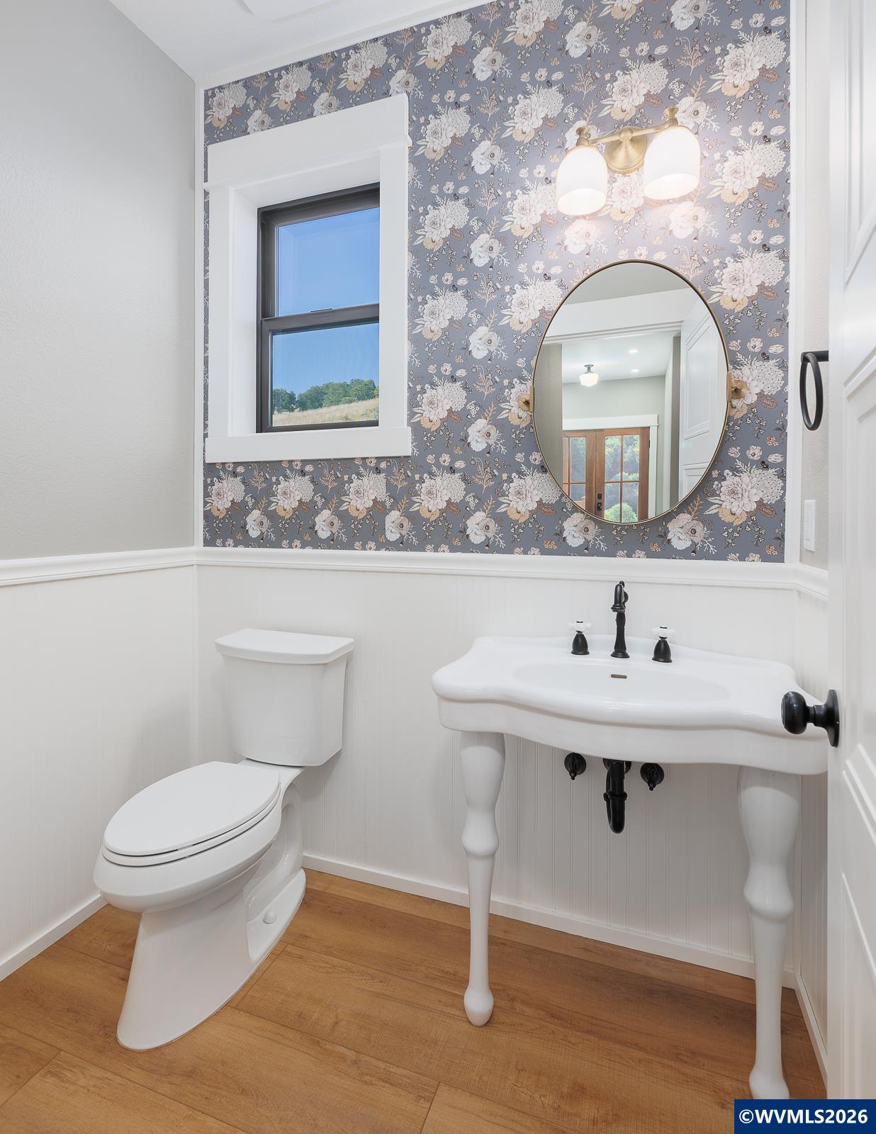 34370 Hawk Hill Road Philomath, OR 97370 - Photo 22 of 50 a bathroom with a toilet a sink and mirror
