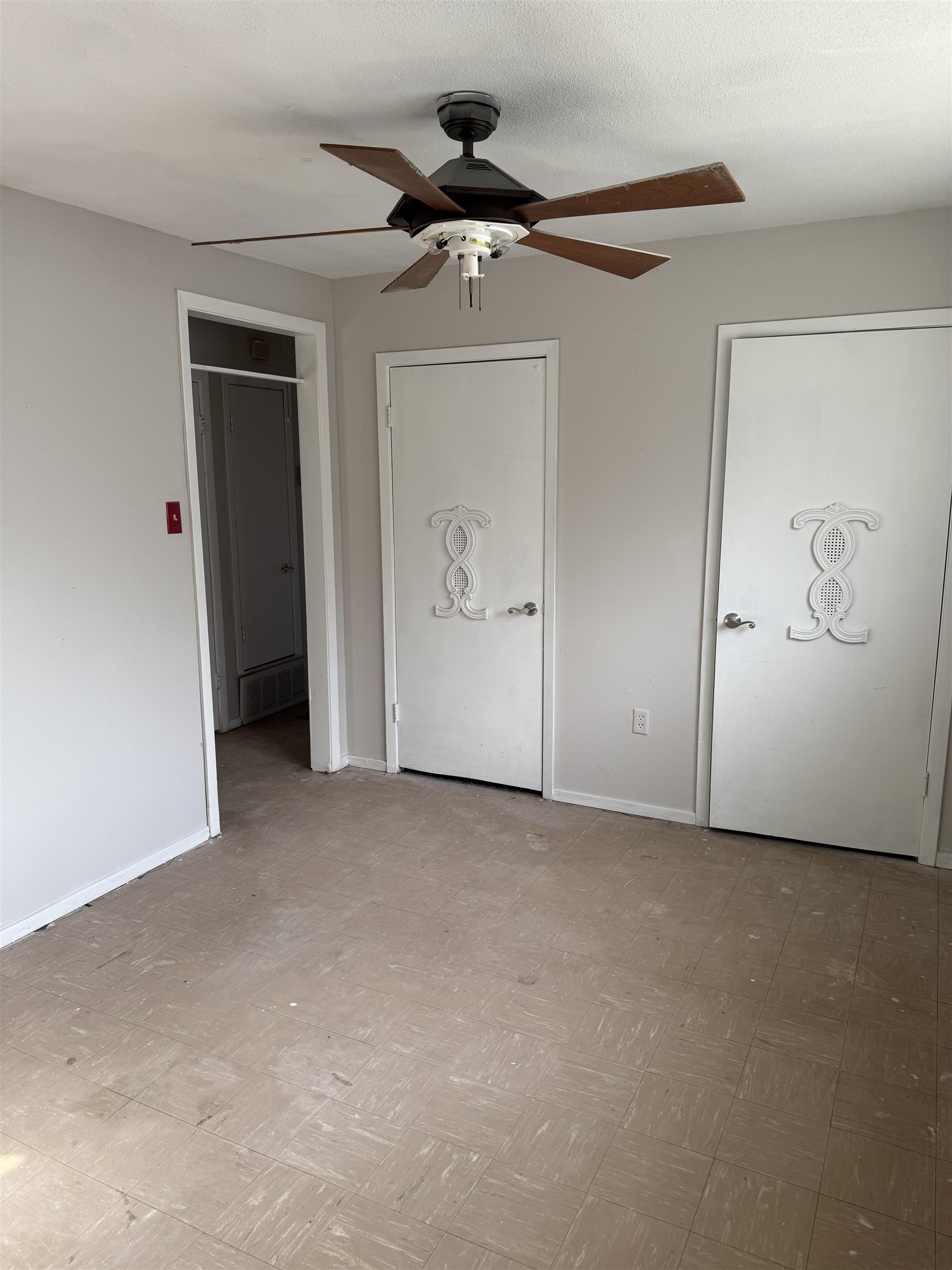 676 Nonconnah Road Memphis, TN 38109 - Photo 12 of 20 Unfurnished bedroom with light floors and ceiling fan