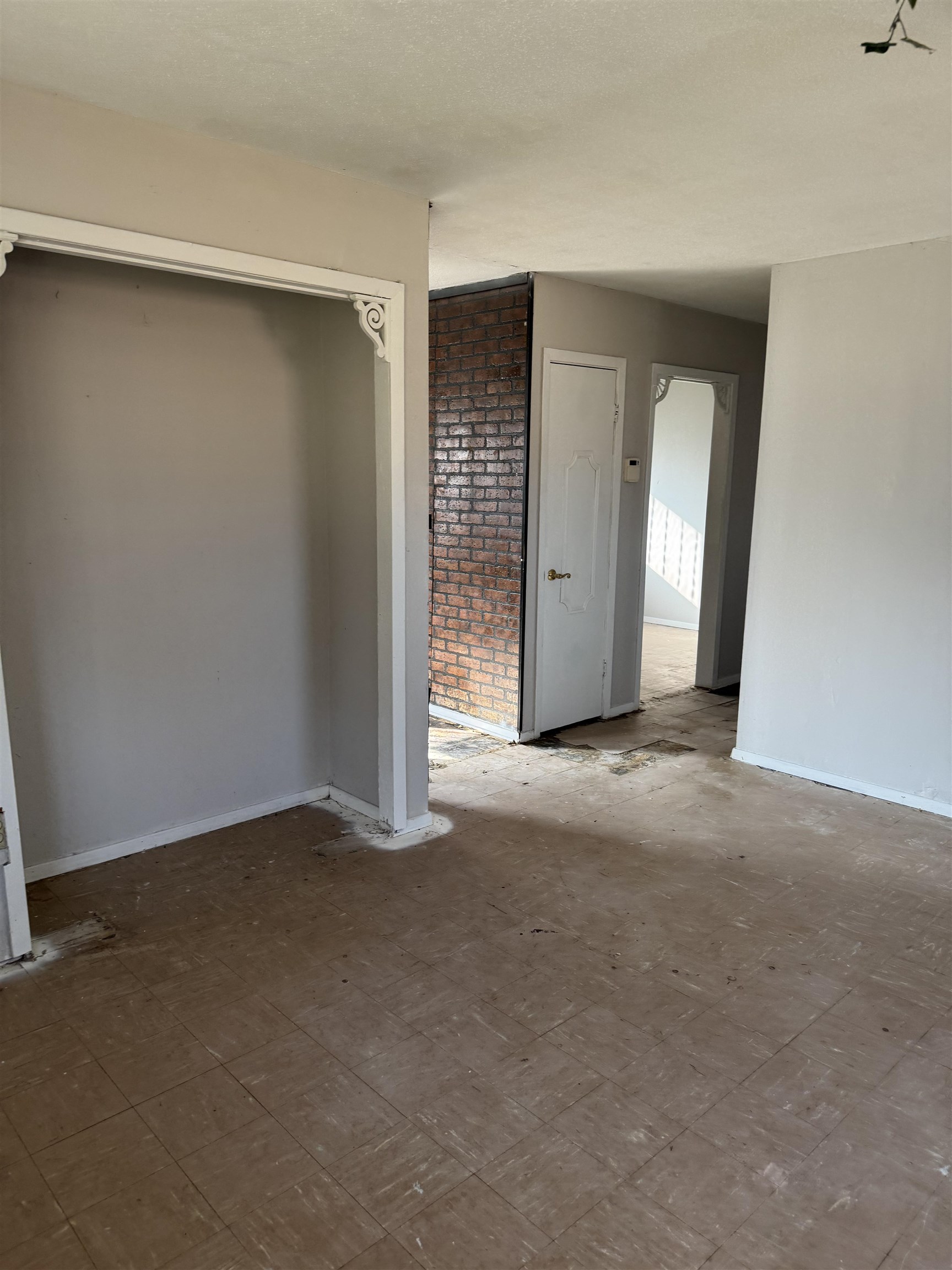 676 Nonconnah Road Memphis, TN 38109 - Photo 10 of 20 Empty room featuring tile patterned floors and baseboards