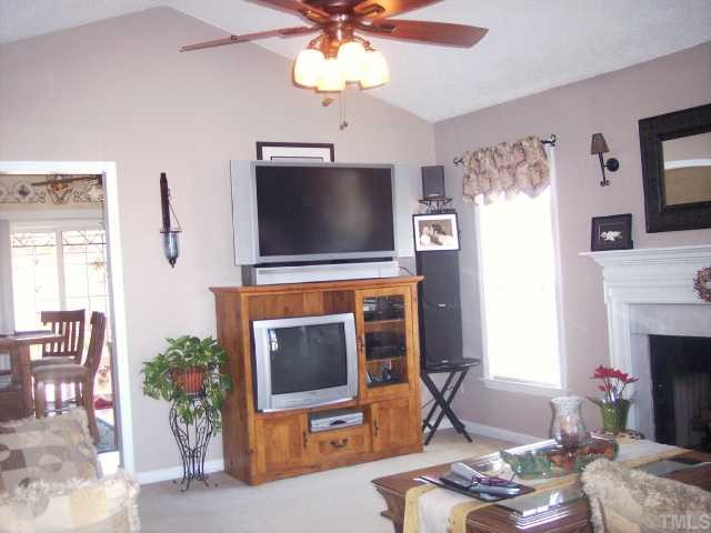 705 Kavkaz Street Raleigh, NC 27610 - Photo 3 of 12 Spacious Great Foom/Family Room with Gas Log Fireplace, Vaulted Ceiling & Ceiling Fan!