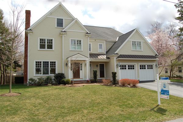 27 Oxford Road Wellesley, MA 02481 - Photo 1 of 19 a front view of a house with a yard and trees
