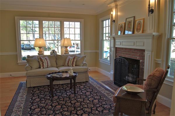 27 Oxford Road Wellesley, MA 02481 - Photo 11 of 19 a living room with furniture and a fireplace