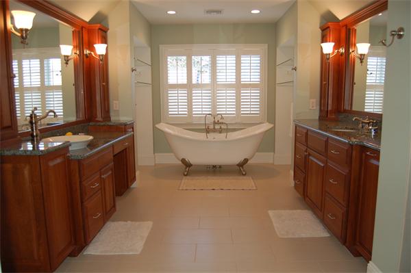 27 Oxford Road Wellesley, MA 02481 - Photo 15 of 19 a bathroom with a granite countertop sink and a bathtub