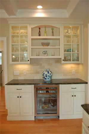 27 Oxford Road Wellesley, MA 02481 - Photo 4 of 19 a kitchen with a stove and cabinets
