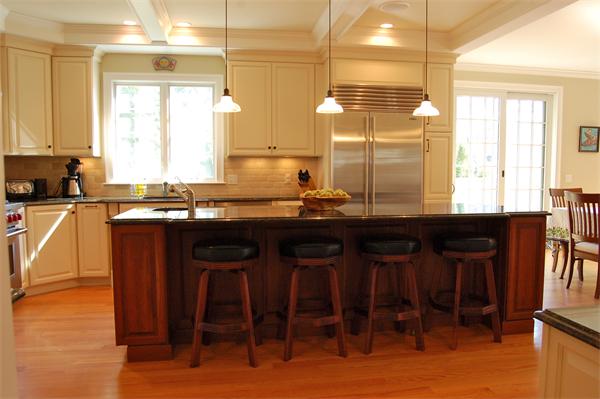 27 Oxford Road Wellesley, MA 02481 - Photo 7 of 19 a kitchen with a sink a window and chairs