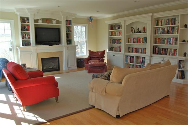 27 Oxford Road Wellesley, MA 02481 - Photo 9 of 19 a living room with furniture fireplace and flat screen tv