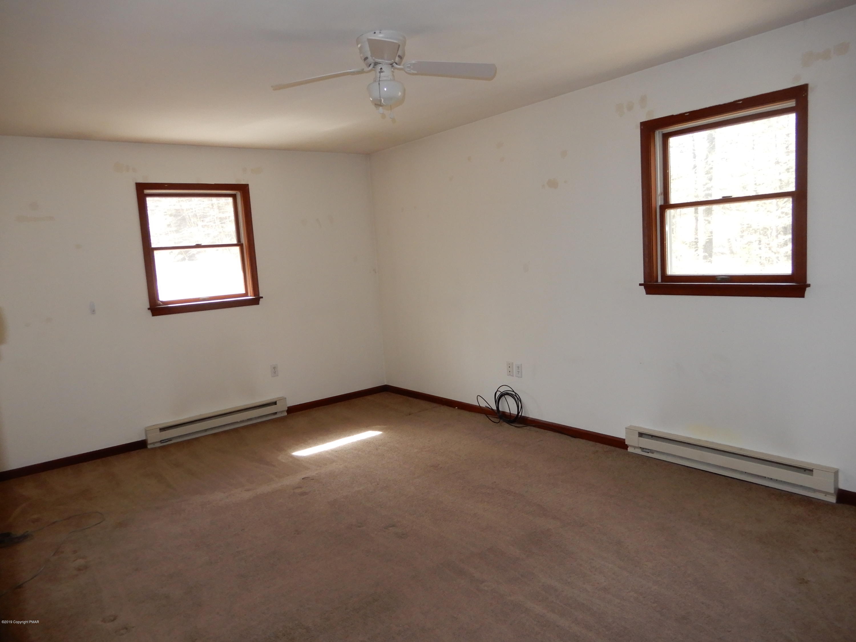 1712 Vineyard Road Stroudsburg, PA 18360 - Photo 17 of 38 an empty room with a window