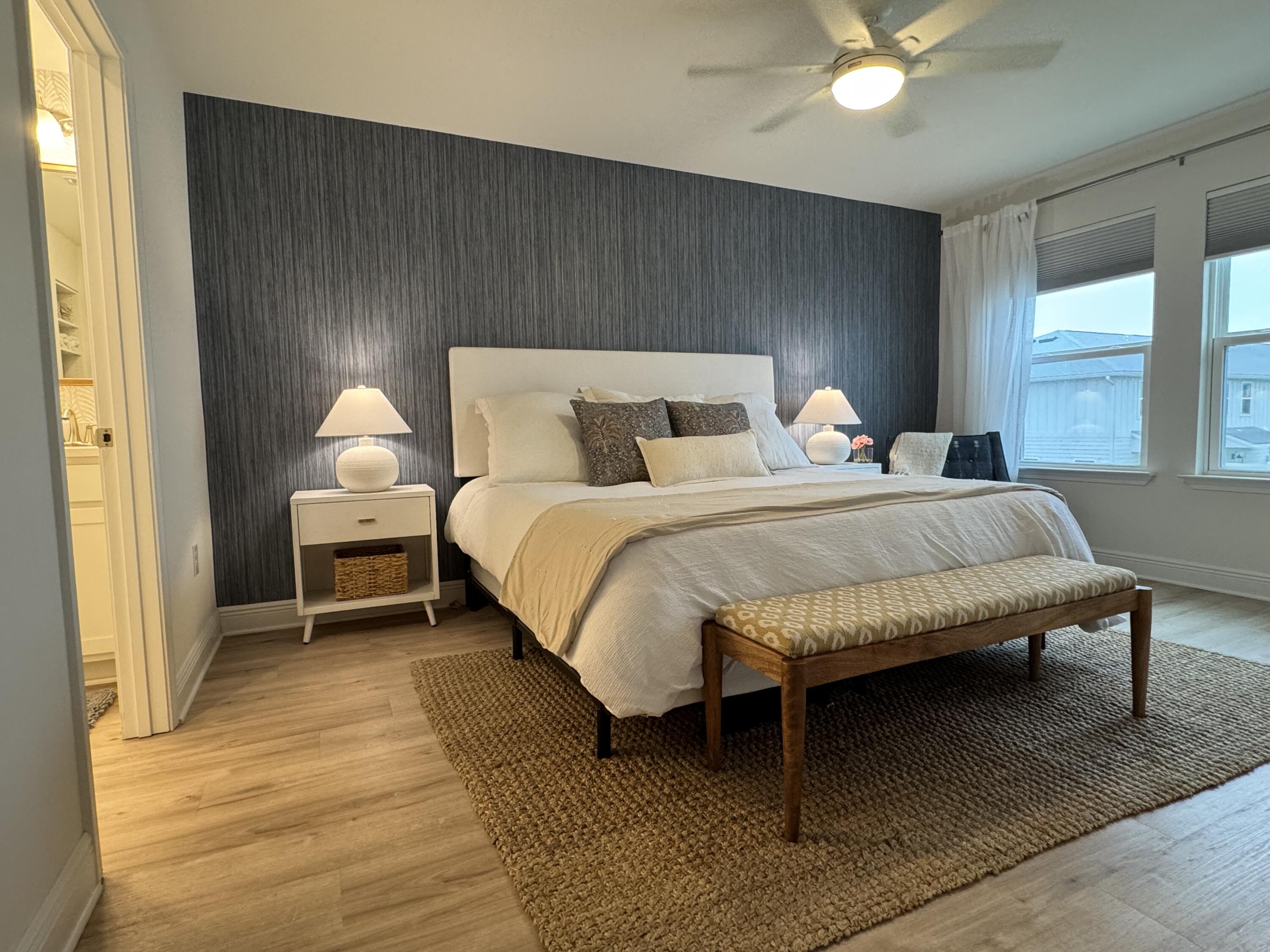 40 Redbird Loop Destin, FL 32541 - Photo 5 of 14 a bedroom with a bed and a window