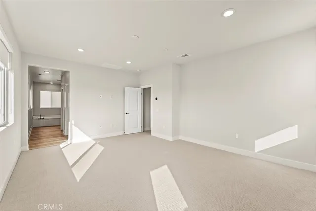 a bathroom with a shower and a tub