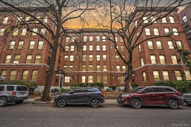 a view of a car parked in front of a building