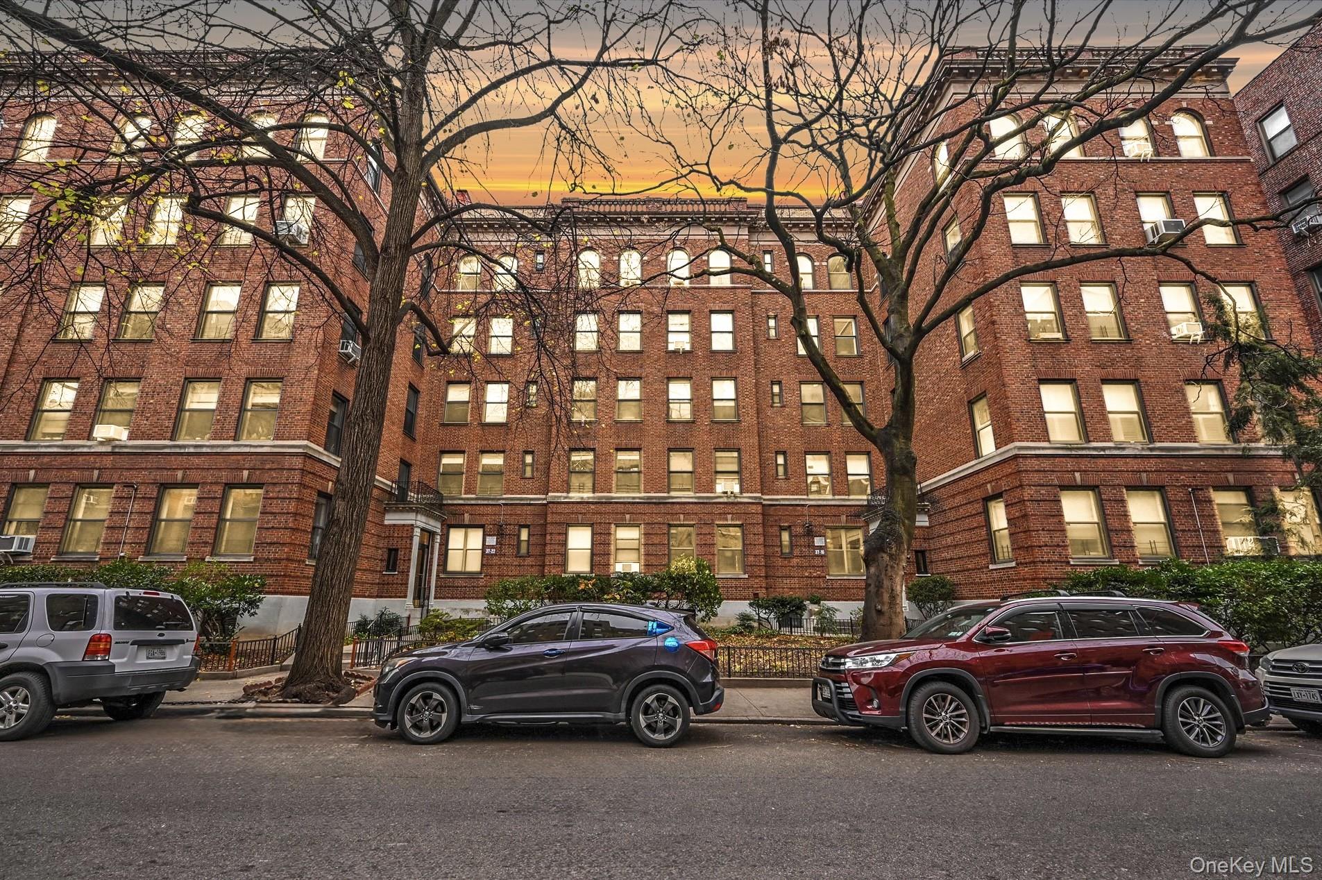a view of a car parked in front of a building