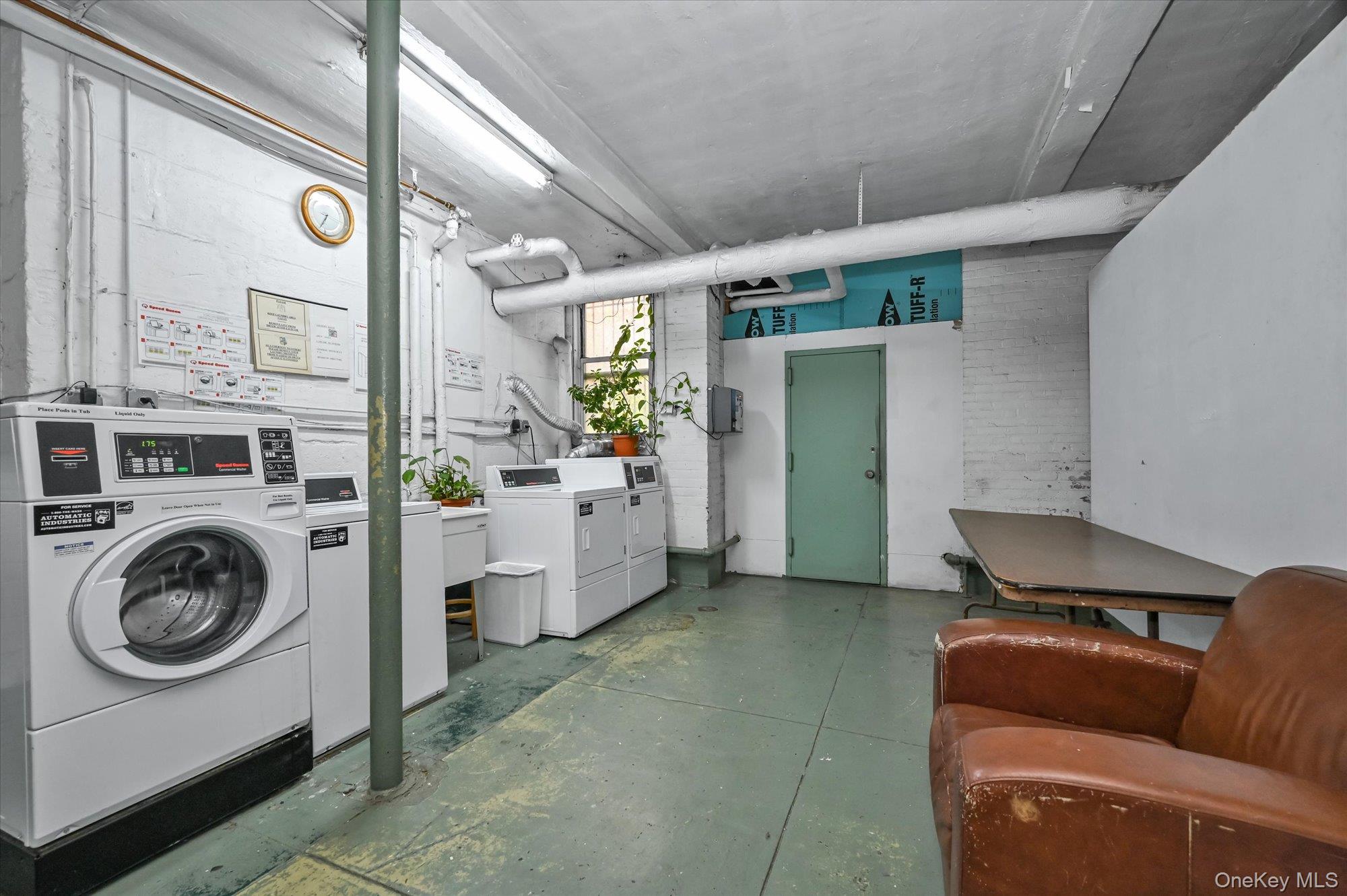 37-16 80th Street, Unit 2 Queens, NY 11372 - Photo 12 of 18 a utility room with dryer and washer