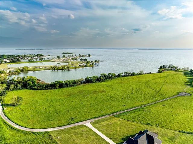 a view of a swimming pool with a garden