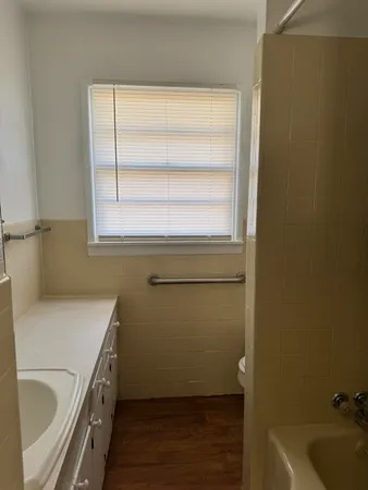 a utility room with a sink dryer and washer