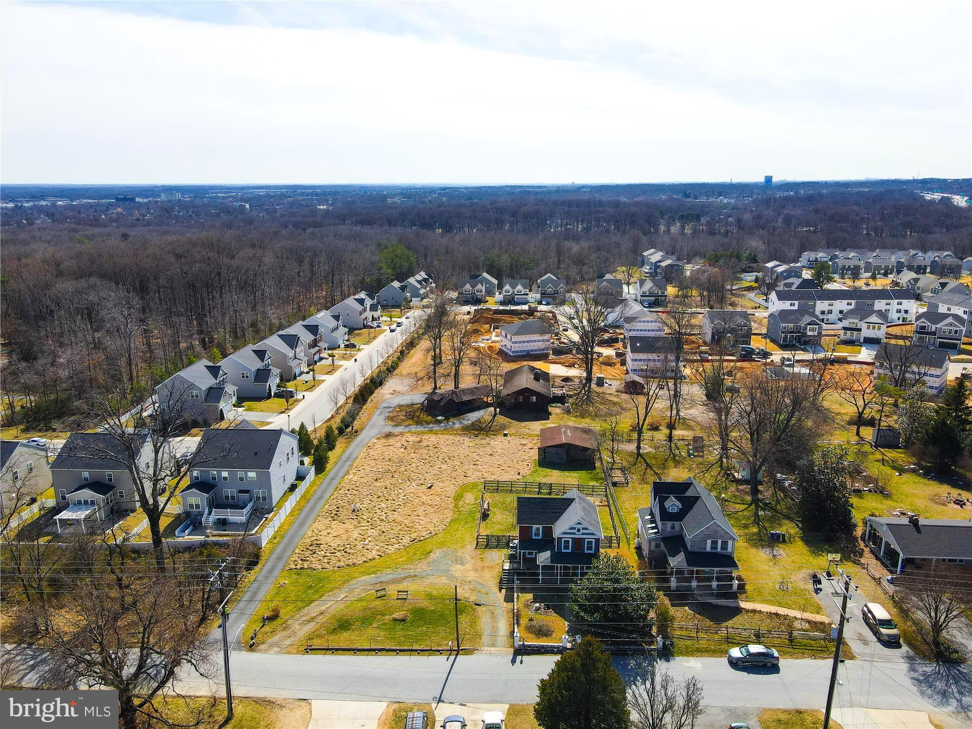 an aerial view of residential building and car parked