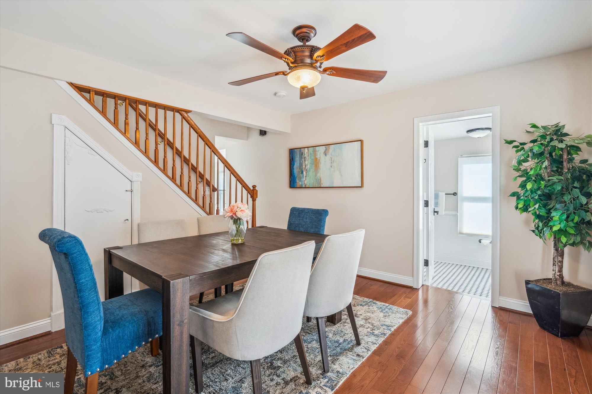 10117 High Ridge Road Laurel, MD 20723 - Photo 15 of 70 a view of a dining room with furniture and wooden floor
