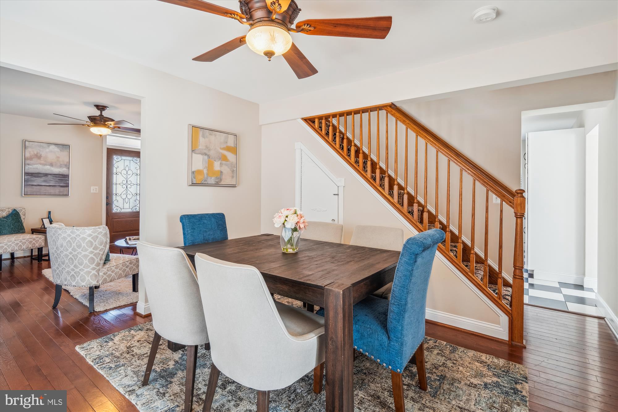 10117 High Ridge Road Laurel, MD 20723 - Photo 18 of 70 a view of a dining room with furniture wooden floor and a chandelier