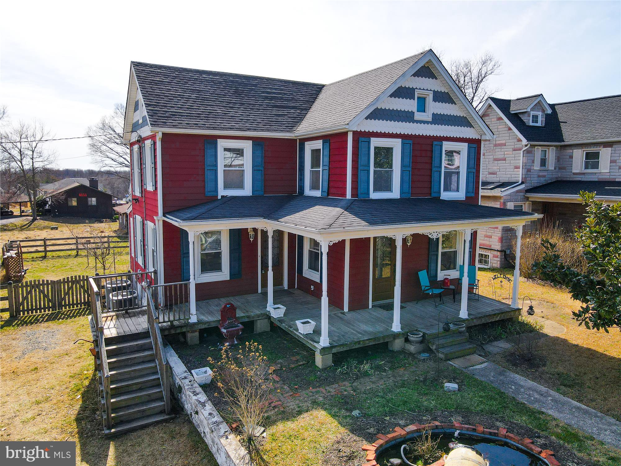 10117 High Ridge Road Laurel, MD 20723 - Photo 2 of 70 front view of a house with a yard