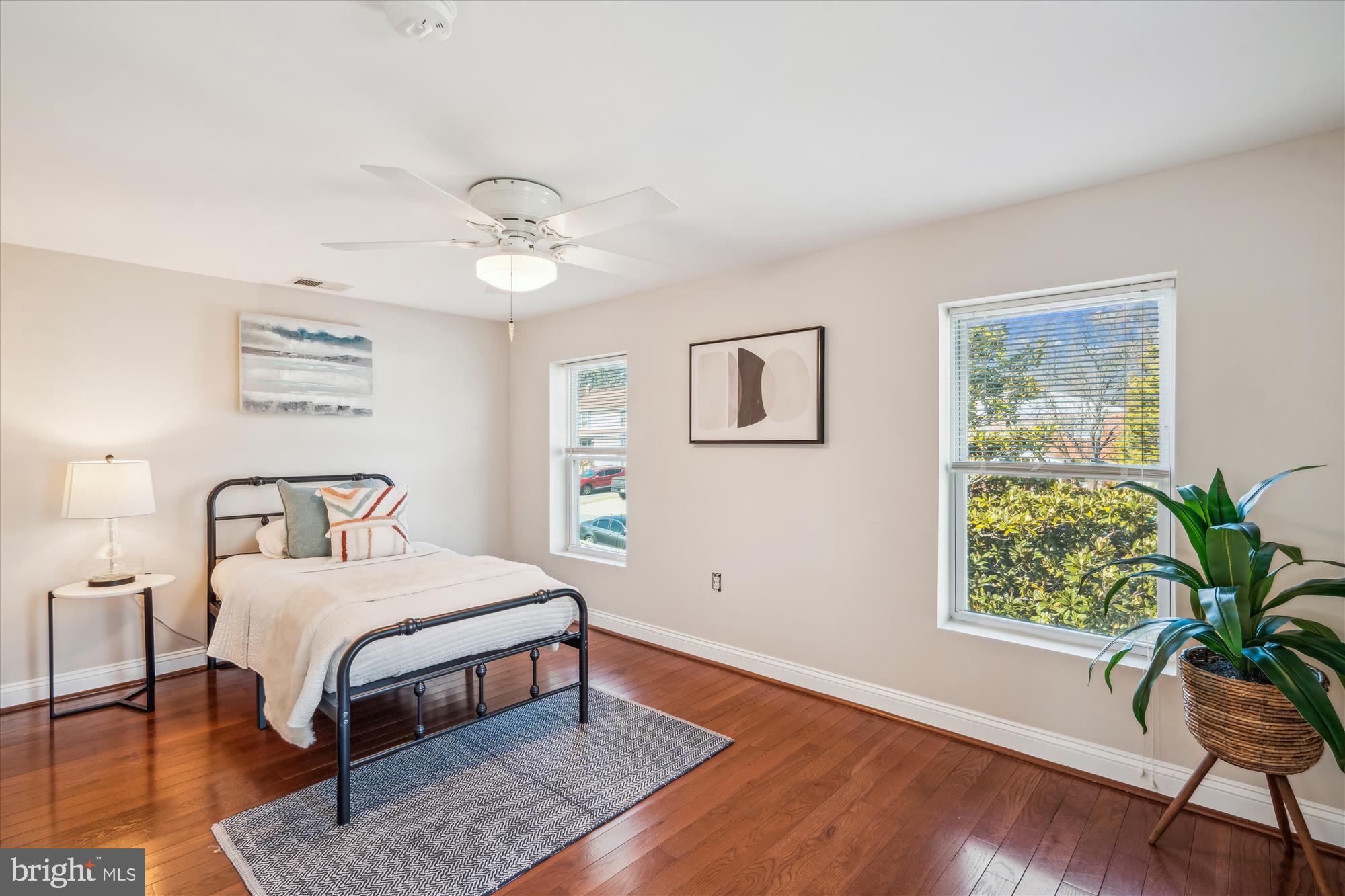 10117 High Ridge Road Laurel, MD 20723 - Photo 41 of 70 a bedroom with a bed table and a window