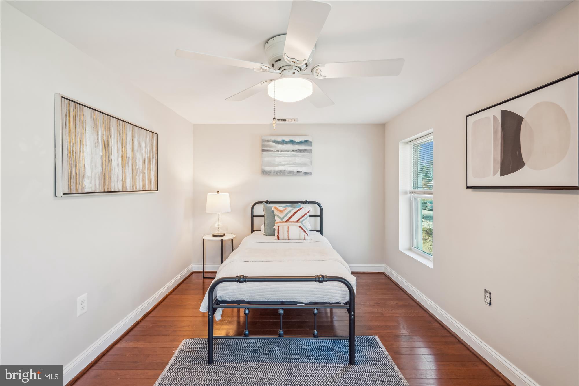 10117 High Ridge Road Laurel, MD 20723 - Photo 45 of 70 a bedroom with a bed and a window