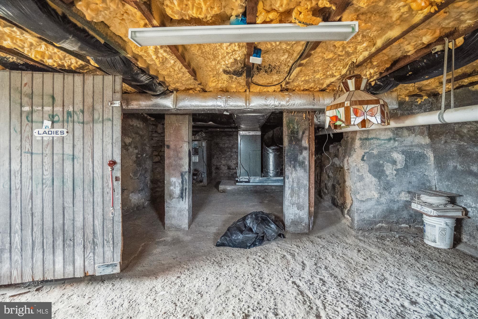 10117 High Ridge Road Laurel, MD 20723 - Photo 55 of 70 a view of a porch with a table and chairs
