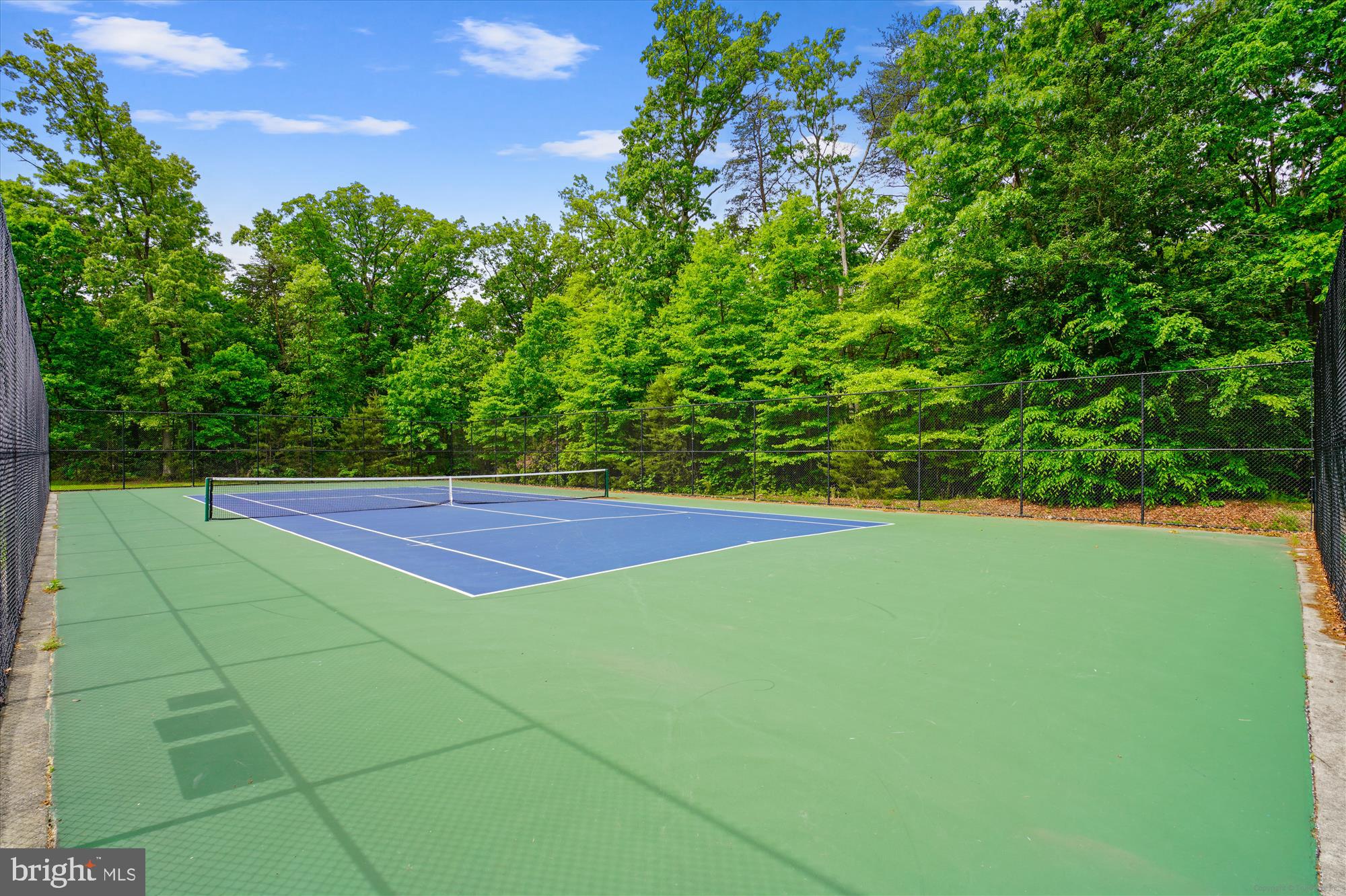 10117 High Ridge Road Laurel, MD 20723 - Photo 66 of 70 a view of an outdoor space and basketball court