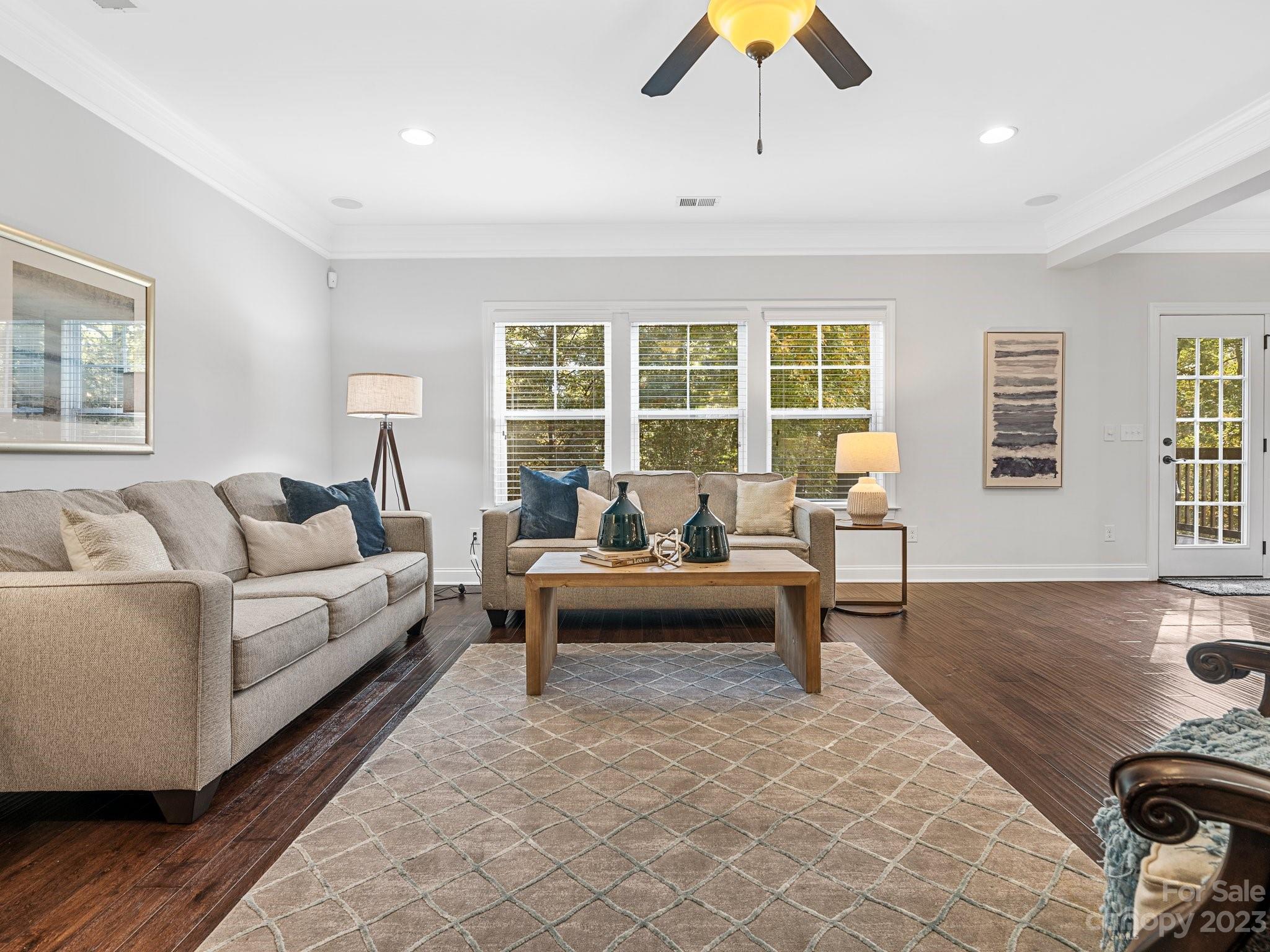 1021 Ridgehaven Road Waxhaw, NC 28173 - Photo 10 of 36 a living room with furniture and a large window