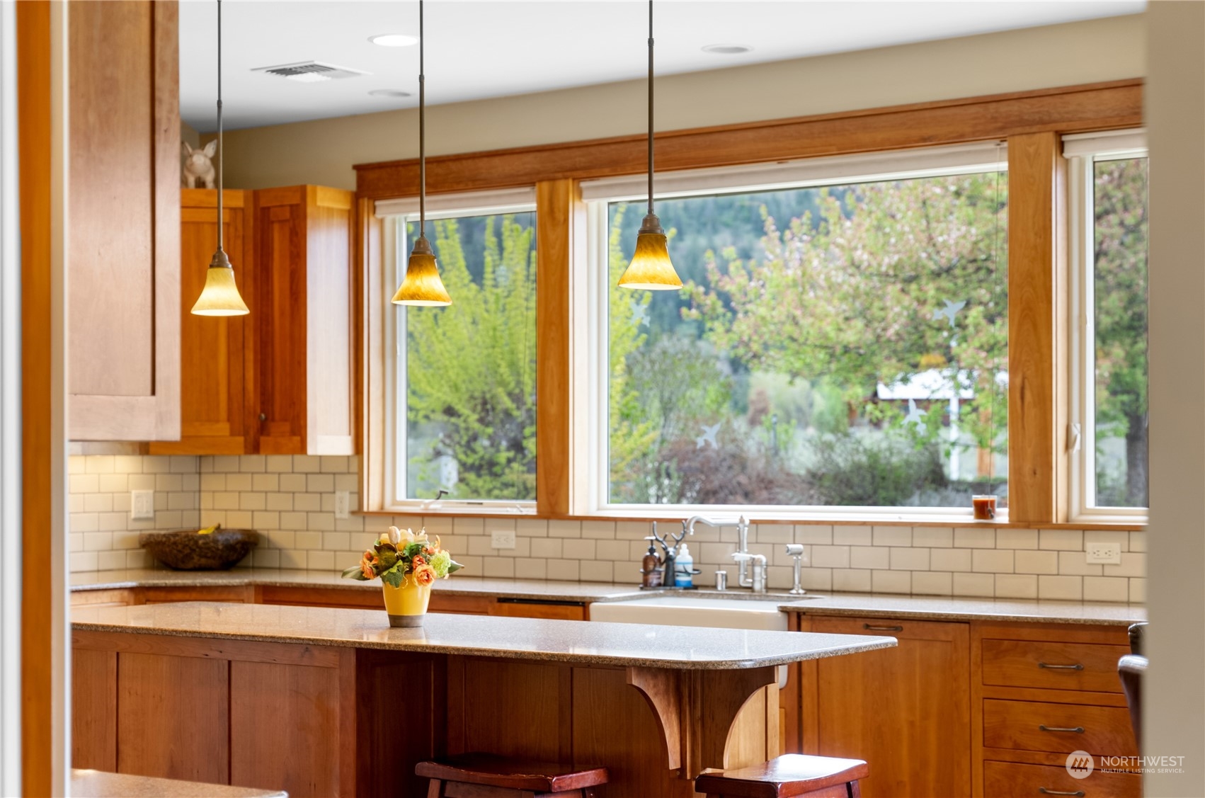 5 Wolfden Road Winthrop, WA 98862 - Photo 14 of 40 a kitchen with a window a sink and a refrigerator