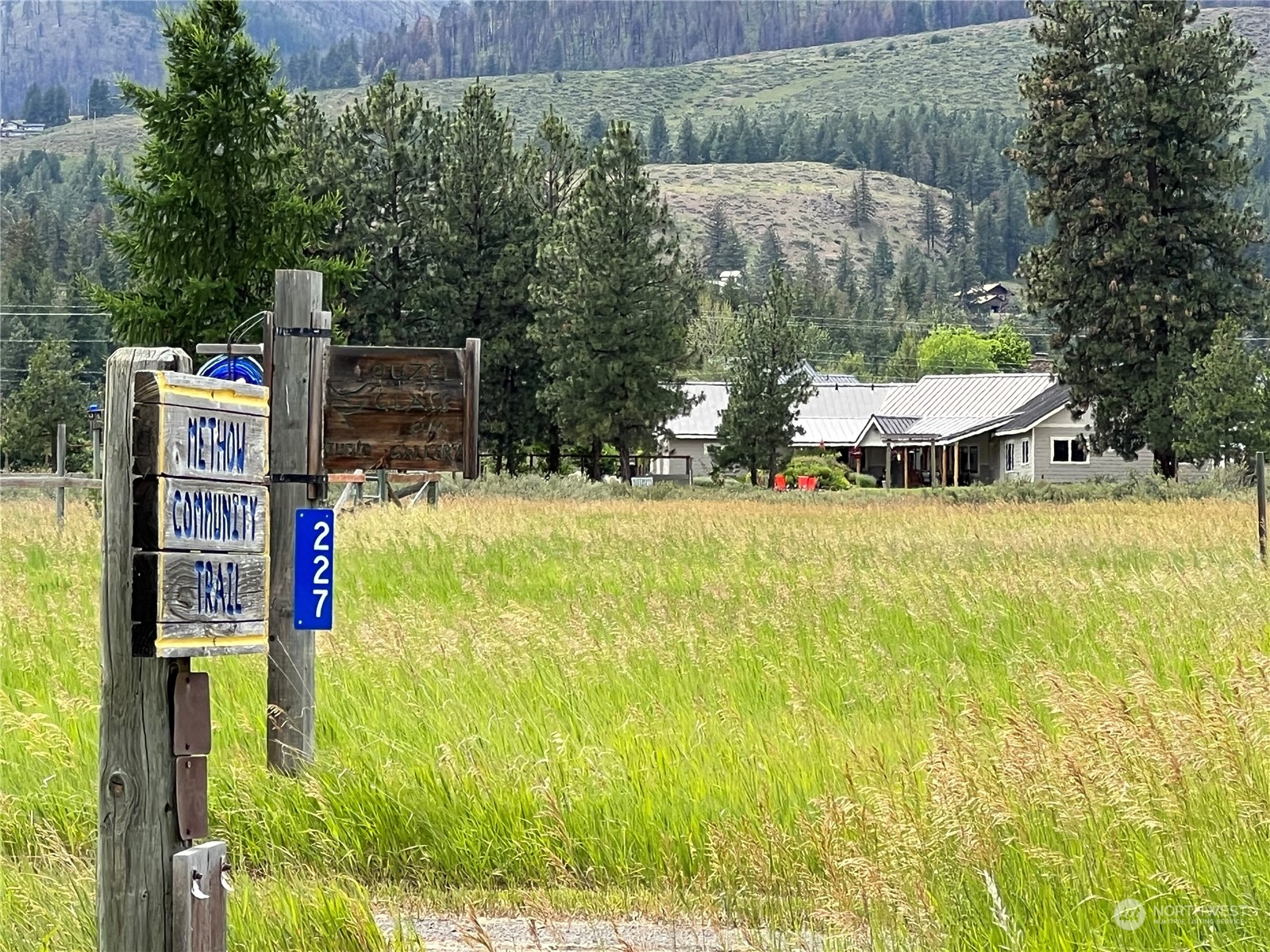 5 Wolfden Road Winthrop, WA 98862 - Photo 3 of 40 a view of swimming pool with an outdoor space and seating area