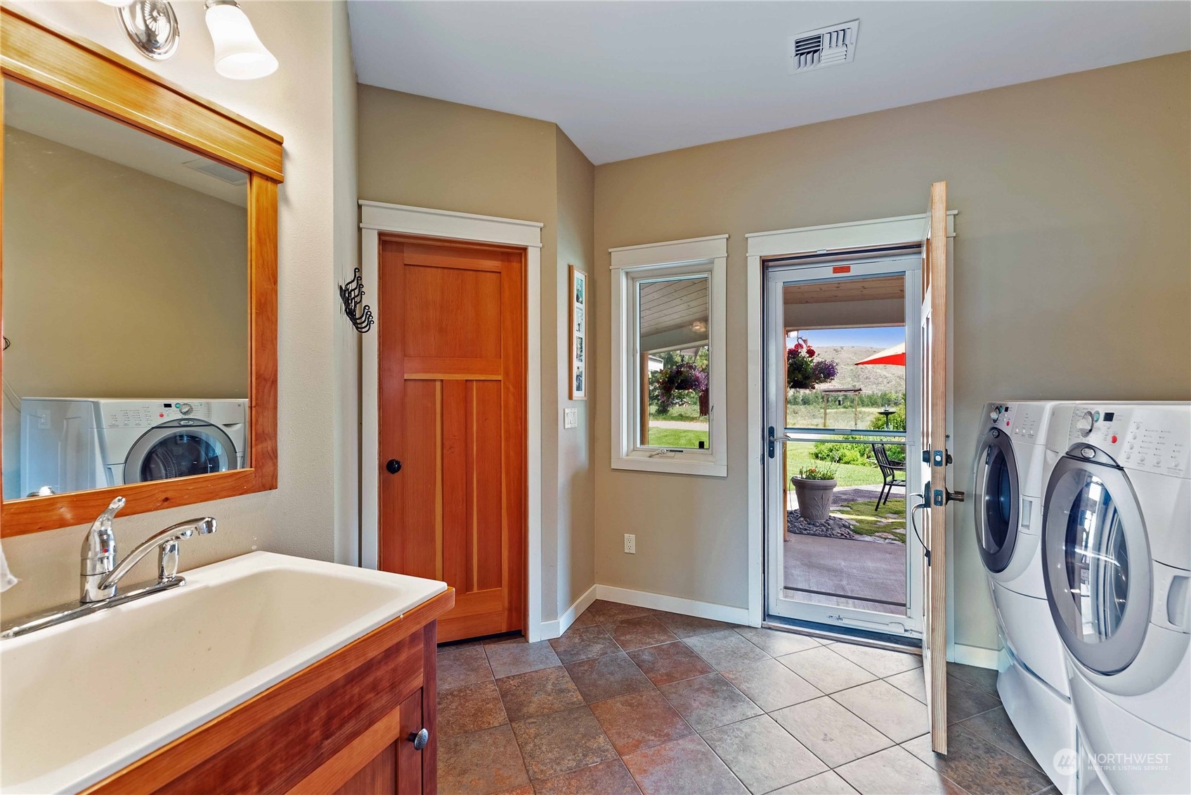 5 Wolfden Road Winthrop, WA 98862 - Photo 31 of 40 a bathroom with a sink and a mirror