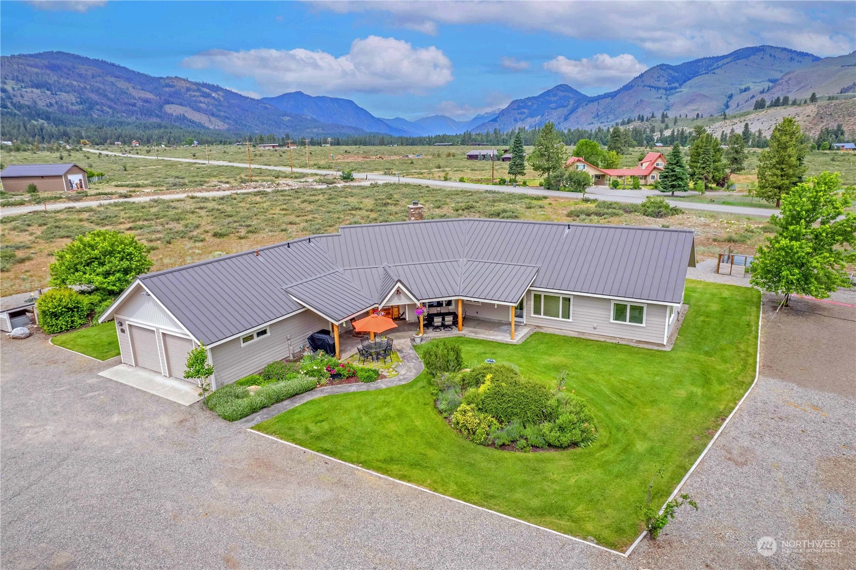 5 Wolfden Road Winthrop, WA 98862 - Photo 39 of 40 an aerial view of a house with garden