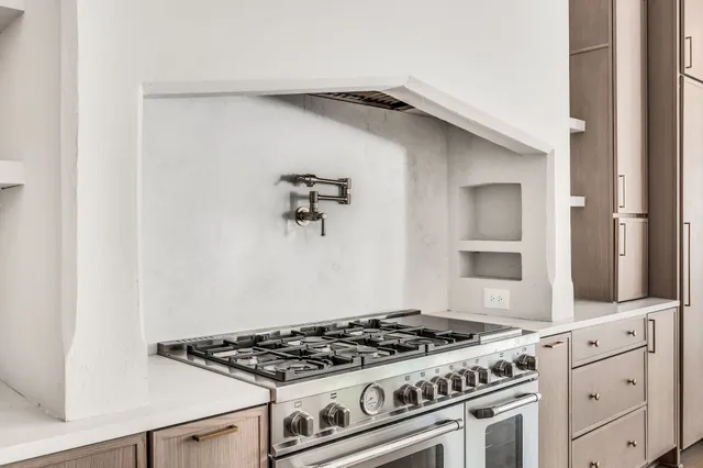 a bathroom with a toilet a sink and shower