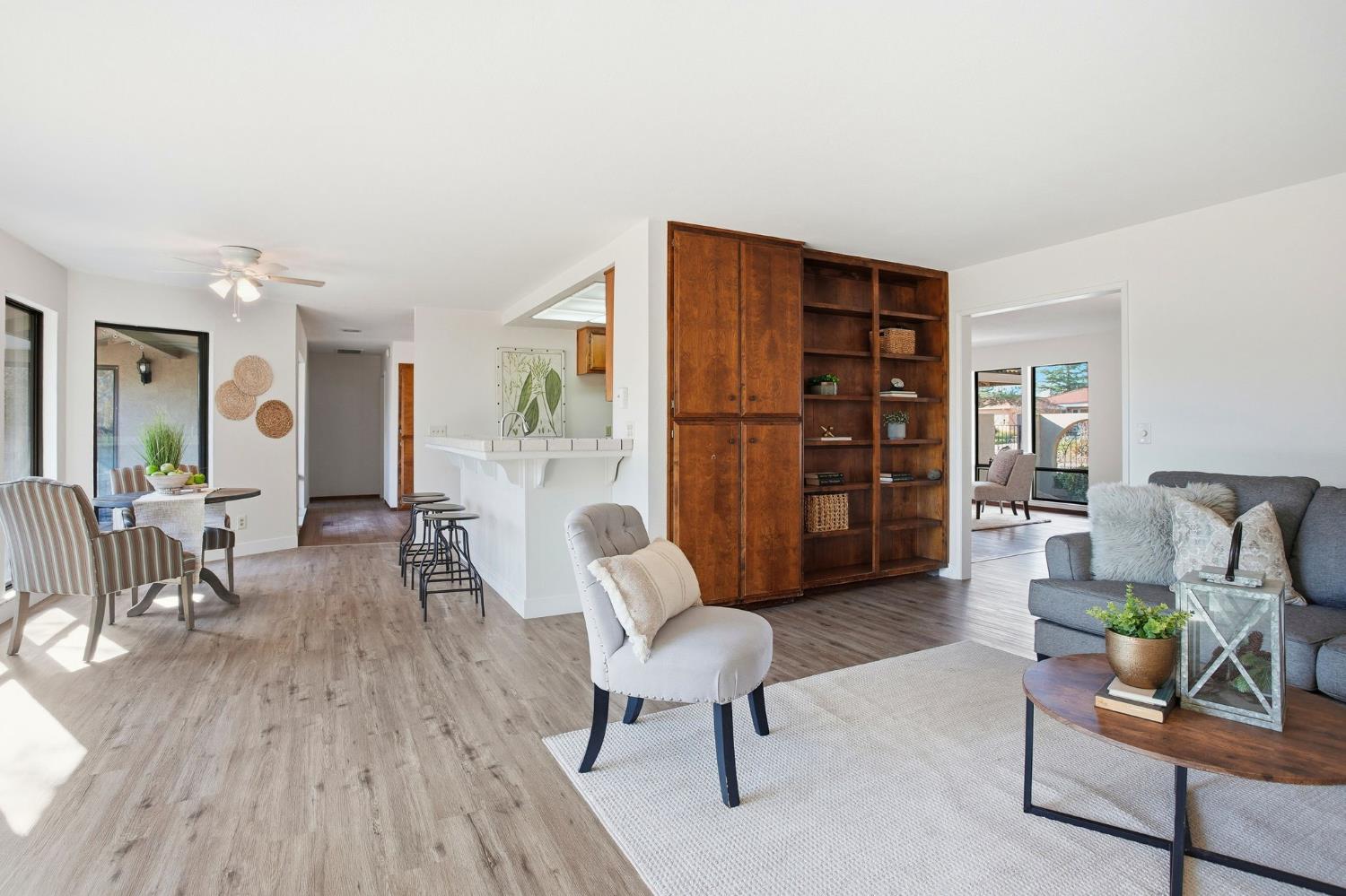 6923 Pera Drive Rancho Murieta, CA 95683 - Photo 11 of 35 a living room with furniture and a wooden floor
