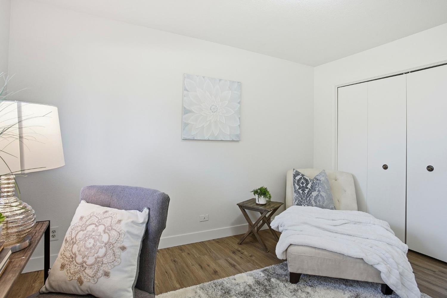 6923 Pera Drive Rancho Murieta, CA 95683 - Photo 28 of 35 a bedroom with a bed and a couch