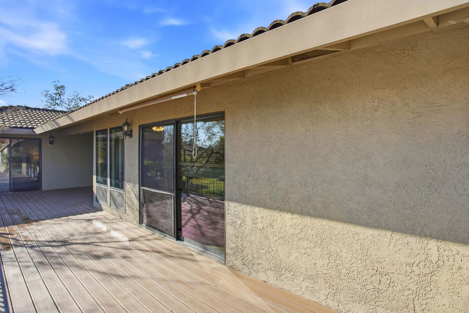 6923 Pera Drive Rancho Murieta, CA 95683 - Photo 30 of 35 a view of a house with a backyard