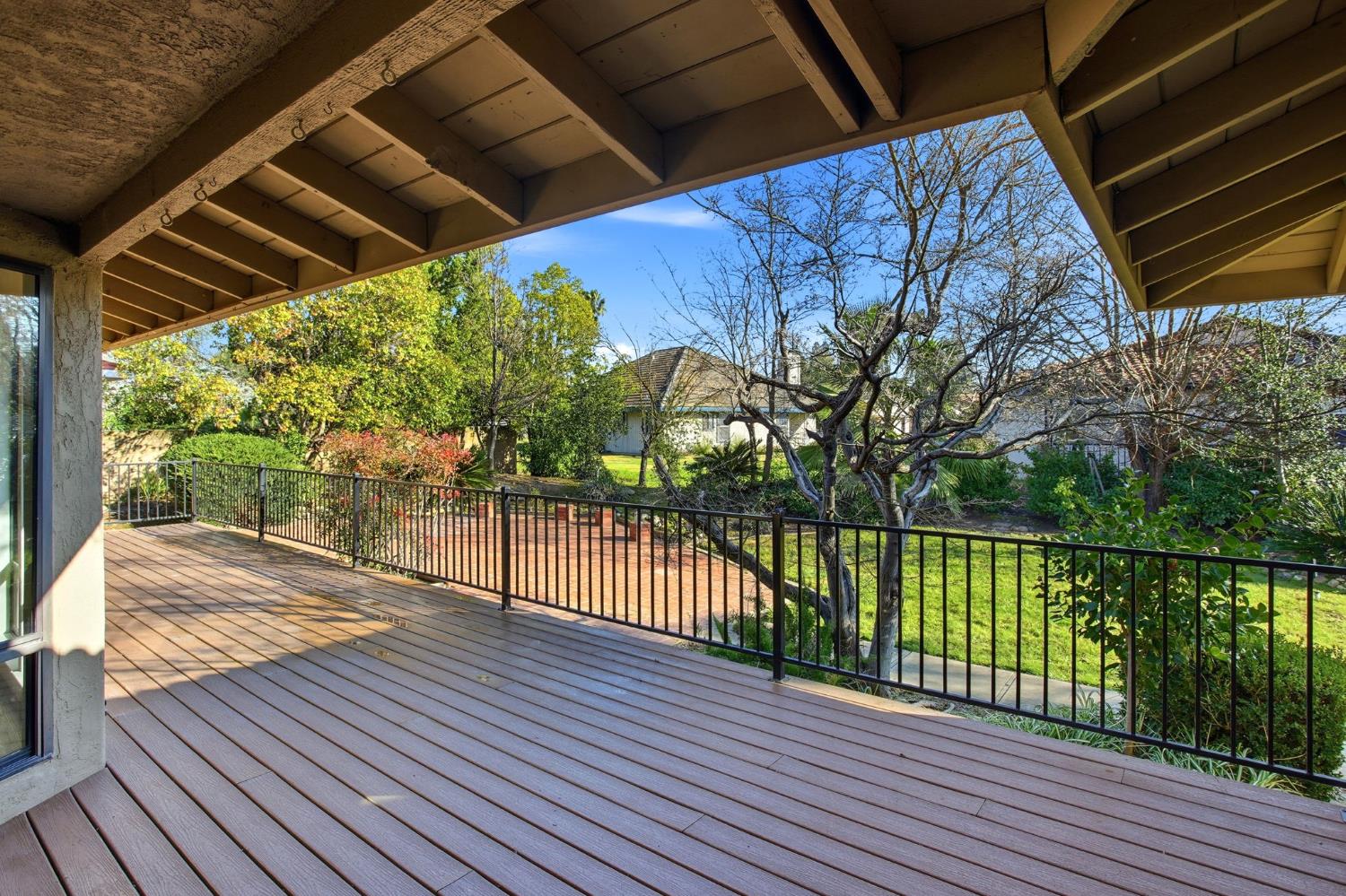 6923 Pera Drive Rancho Murieta, CA 95683 - Photo 31 of 35 a view of a balcony with wooden floor