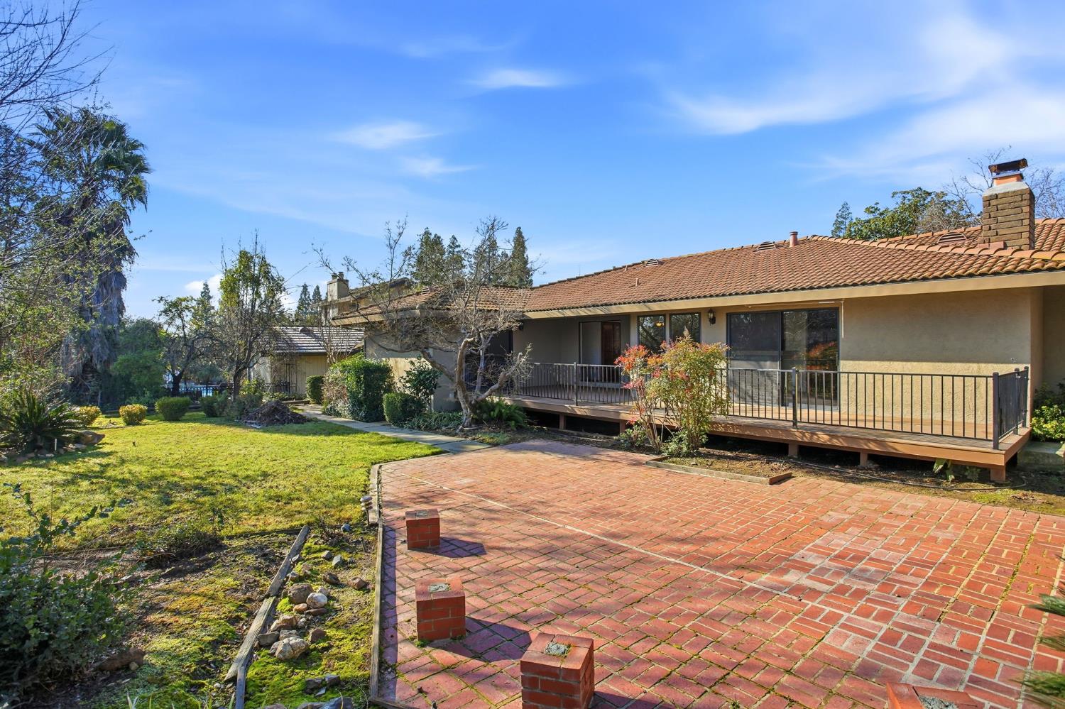 6923 Pera Drive Rancho Murieta, CA 95683 - Photo 33 of 35 a view of a house with backyard and sitting area